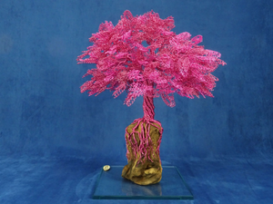 PINK CURLS - Aluminium and olive wood sculpture _ Mosche Bianche